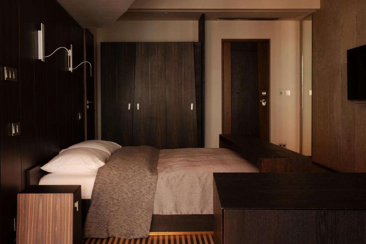 Hotel Monopol Wroclaw Dış mekan fotoğraf A bedroom
