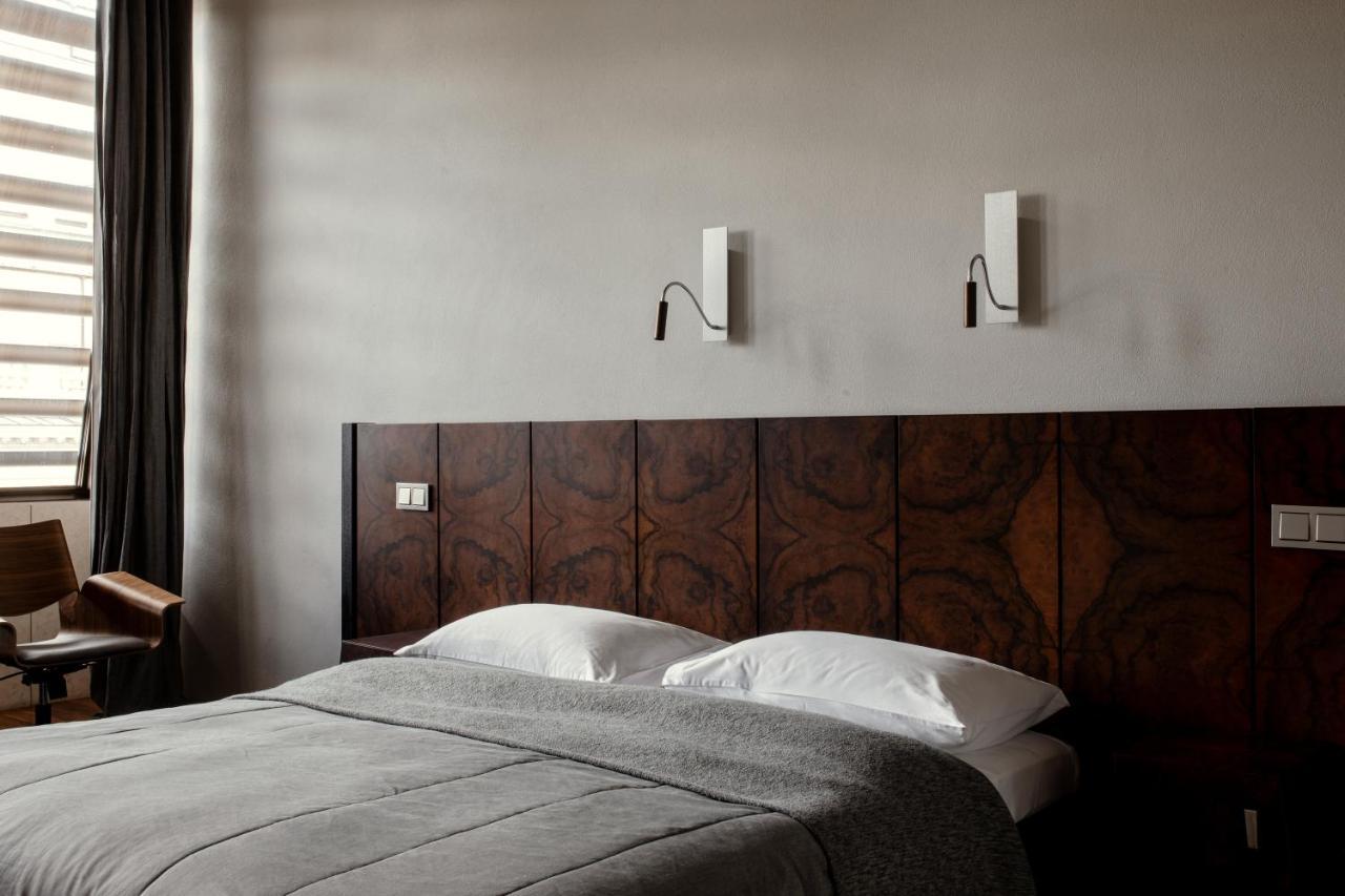 Hotel Monopol Wroclaw Dış mekan fotoğraf A bedroom at the Hotel
