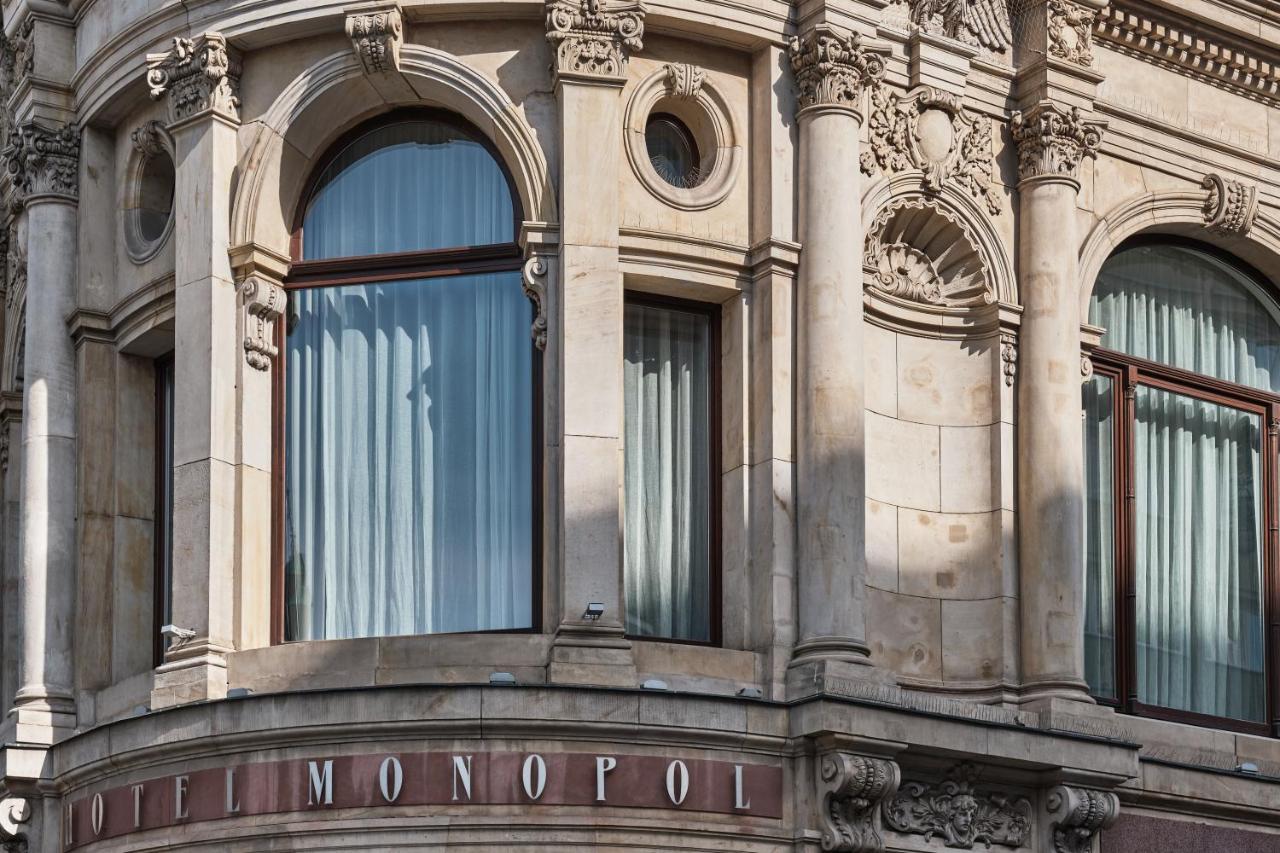 Hotel Monopol Wroclaw Dış mekan fotoğraf The hotel's name on the front of the building